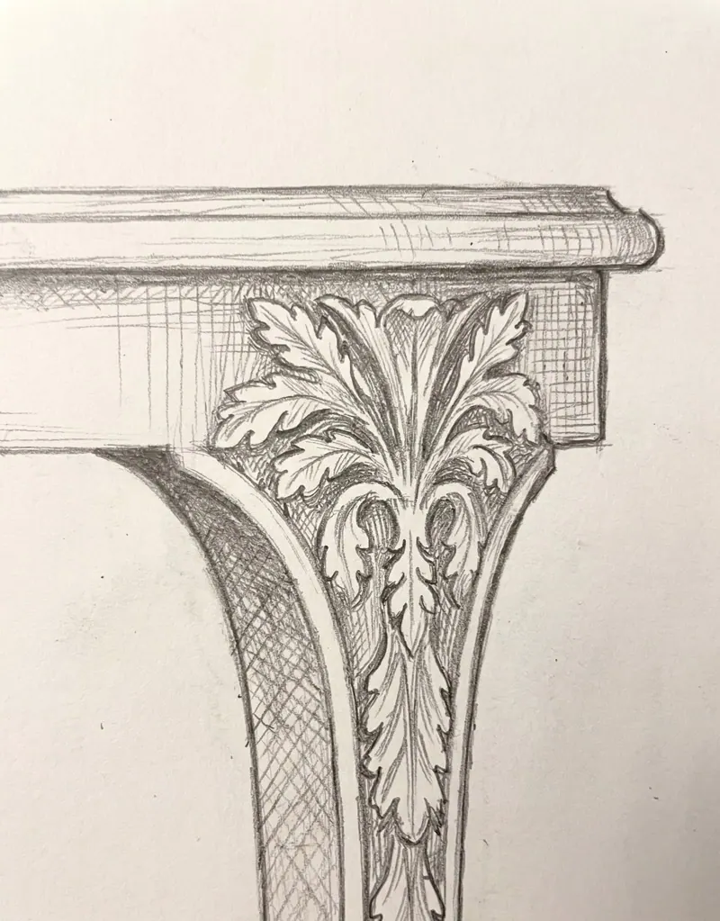 Master artisan hand-carving the Barg side table in solid Sheesham wood